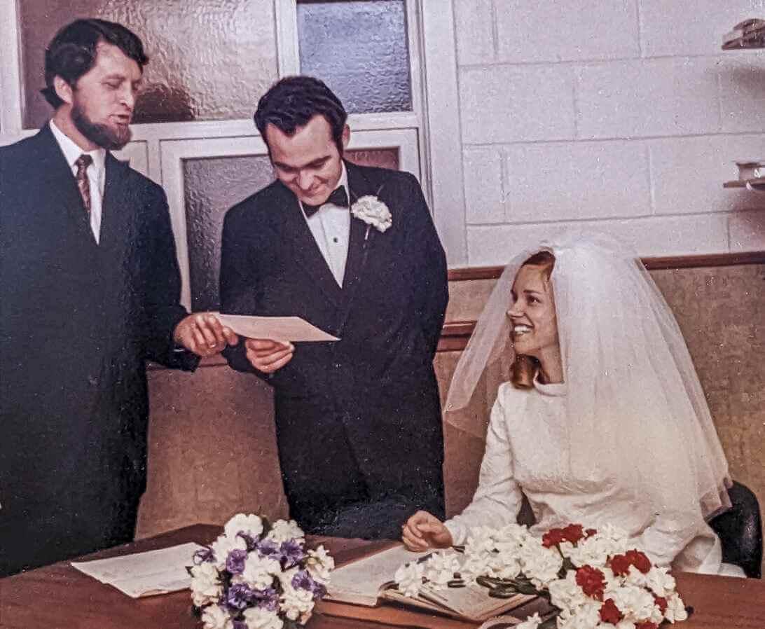 Signing the official paperwork with Rev. Groen on our wedding day, May 2, 1970, in Toronto. At this time Rev. Groen was minister in Owen Sound.